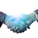 Image of medical device contract manufacturing professionals shaking hands.