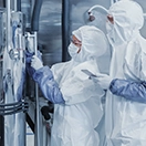 Image of life science manufacturing professionals working.