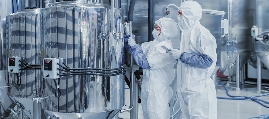 Image of life science manufacturing professionals working.