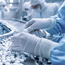 Image of a pharma manufacturer working.