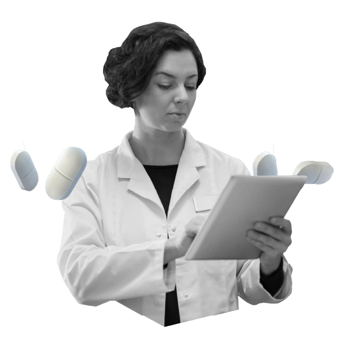 Image of lady with a tablet and pills